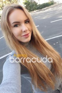 Escort Barbara with Brunette hair