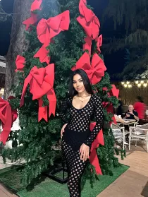 Escort Celine Pham with black hair