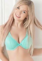 Aqua`s blonde hair and beautiful face oozes femininity